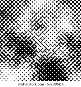 Abstract halftone pattern formed by black and white circles of different size.Vector illustration of a dotted background