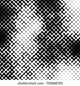 Abstract halftone pattern formed by black and white circles of different size.Vector illustration of a dotted background