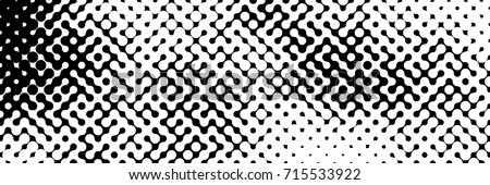 Abstract halftone pattern formed by black and white circles of different size.Vector illustration of a dotted background