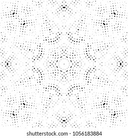Abstract halftone psychedelic kaleidoscopic seamless pattern.vector
