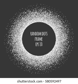 Abstract, halftone, randomly scattered dots round frame with white transparent ink spots isolated on dark background. Paint spray effect.