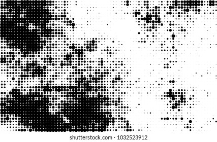 An abstract halftone texture. Black and white pattern of dots on a white background. Texture for printing on business cards, badges, posters, labels