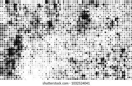 An abstract halftone texture. Black and white pattern of dots on a white background. Texture for printing on business cards, badges, posters, labels