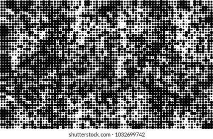 An abstract halftone texture. Black and white pattern of dots on a white background. Texture for printing on business cards, badges, posters, labels