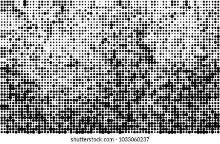 An abstract halftone texture. Black and white pattern of dots on a white background. Texture for printing on business cards, badges, posters, labels