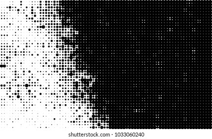 An abstract halftone texture. Black and white pattern of dots on a white background. Texture for printing on business cards, badges, posters, labels