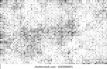 An abstract halftone texture. Black and white pattern of dots on a white background. Texture for printing on business cards, badges, posters, labels