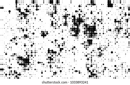 An abstract halftone texture. Black and white pattern of dots on a white background. Texture for printing on business cards, badges, posters, labels