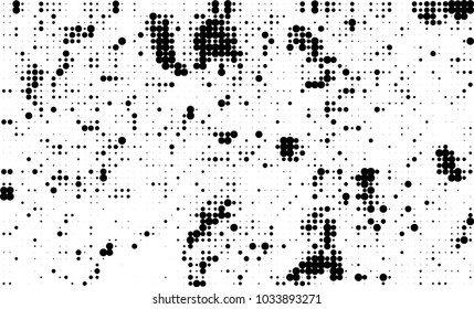 An abstract halftone texture. Black and white pattern of dots on a white background. Texture for printing on business cards, badges, posters, labels