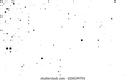 An abstract halftone texture. Black and white pattern of dots on a white background. Texture for printing on business cards, badges, posters, labels