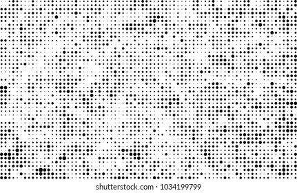 An abstract halftone texture. Black and white pattern of dots on a white background. Texture for printing on business cards, badges, posters, labels