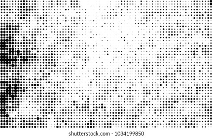 An abstract halftone texture. Black and white pattern of dots on a white background. Texture for printing on business cards, badges, posters, labels