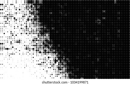 An abstract halftone texture. Black and white pattern of dots on a white background. Texture for printing on business cards, badges, posters, labels