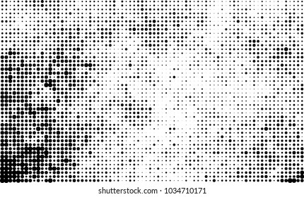 An abstract halftone texture. Black and white pattern of dots on a white background. Texture for printing on business cards, badges, posters, labels