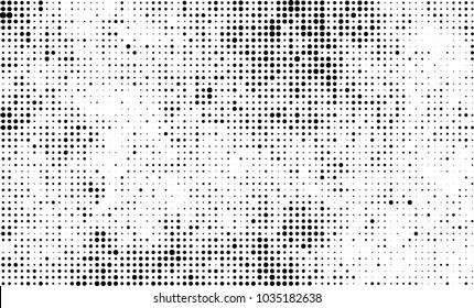 An abstract halftone texture. Black and white pattern of dots on a white background. Texture for printing on business cards, badges, posters, labels