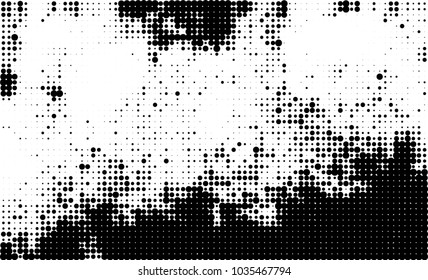 An abstract halftone texture. Black and white pattern of dots on a white background. Texture for printing on business cards, badges, posters, labels