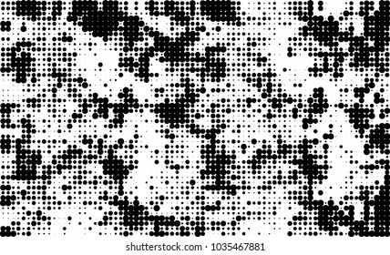 An abstract halftone texture. Black and white pattern of dots on a white background. Texture for printing on business cards, badges, posters, labels