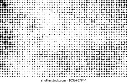 An abstract halftone texture. Black and white pattern of dots on a white background. Texture for printing on business cards, badges, posters, labels