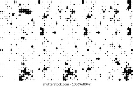 An abstract halftone texture. Black and white pattern of dots on a white background. Texture for printing on business cards, badges, posters, labels