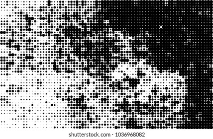 An abstract halftone texture. Black and white pattern of dots on a white background. Texture for printing on business cards, badges, posters, labels