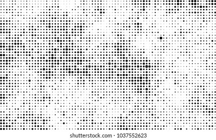 An abstract halftone texture. Black and white pattern of dots on a white background. Texture for printing on business cards, badges, posters, labels