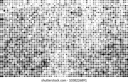 An abstract halftone texture. Black and white pattern of dots on a white background. Texture for printing on business cards, badges, posters, labels