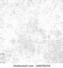 Abstract halftone texture. Chaotic background of black dots on white