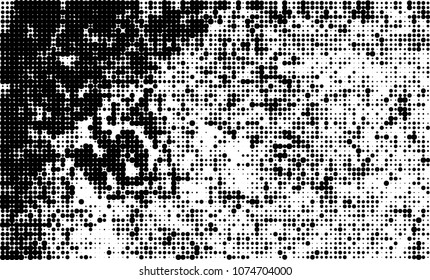 An abstract halftone texture. A chaotic pattern of black dots on a white background