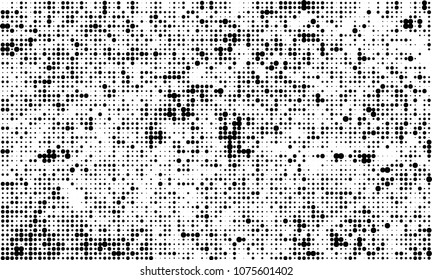 An abstract halftone texture. A chaotic pattern of black dots on a white background