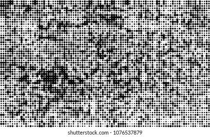 An abstract halftone texture. A chaotic pattern of black dots on a white background