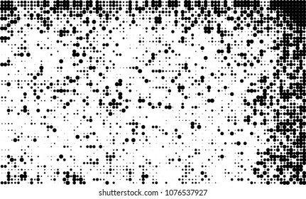 An abstract halftone texture. A chaotic pattern of black dots on a white background