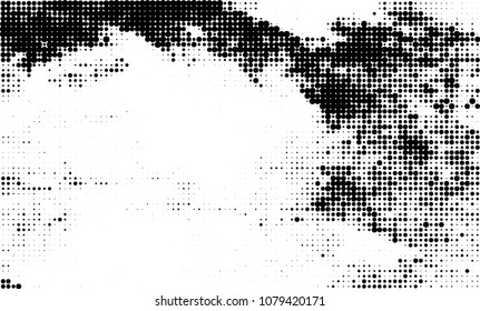 An abstract halftone texture. A chaotic pattern of black dots on a white background