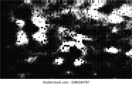 An abstract halftone texture. A chaotic pattern of black dots on a white background