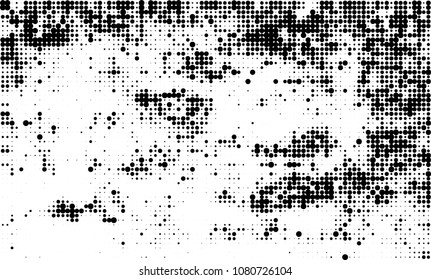 An abstract halftone texture. A chaotic pattern of black dots on a white background