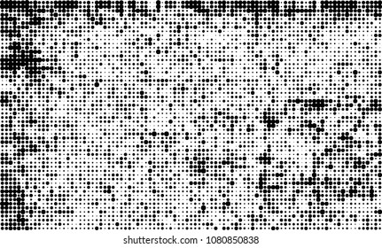 An abstract halftone texture. A chaotic pattern of black dots on a white background