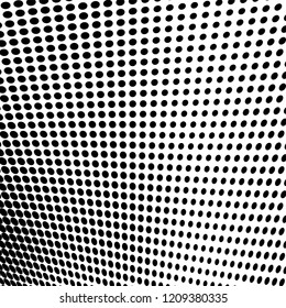 Abstract halftone texture. Chaotic pattern of black dots on white background. Futuristic grunge surface