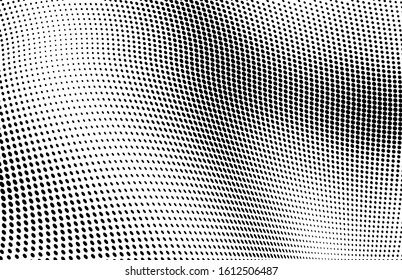 Abstract halftone texture. Chaotic waves of black dots on a white background