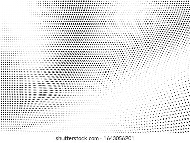 Abstrakte Halbtontextur. Chaotische Wellen schwarzer Punkte auf weißem Hintergrund