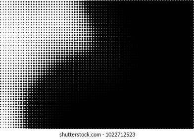 An abstract halftone texture. A pattern of black dots on a white background