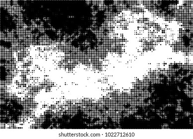 An abstract halftone texture. A pattern of black dots on a white background