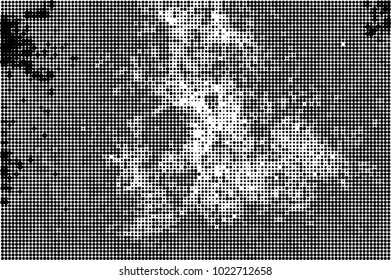An abstract halftone texture. A pattern of black dots on a white background