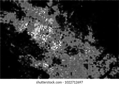An abstract halftone texture. A pattern of black dots on a white background