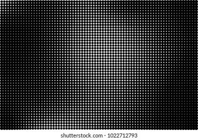 An abstract halftone texture. A pattern of black dots on a white background
