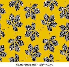 Abstract Hand Drawing Maple Leaves with Leopard Cheetah Animal Skin Seamless Vector Pattern Isolated Yellow Background
