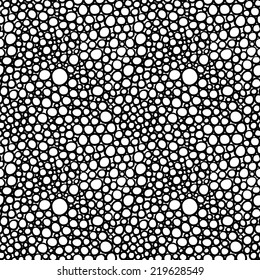 abstract hand drawn black and white circles seamless background pattern with pattern swatch
