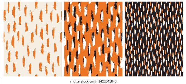 Abstract Hand Drawn Brush Stripes Vector Patterns. Orange, Black and White Stripes on an Orange and Black Backgrounds. Irregular Geometric Repeatable Vector Design for Textile, Wrapping Paper.