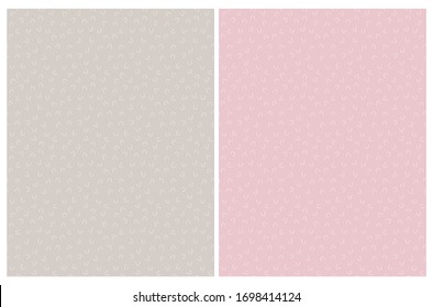 Abstract Hand Drawn Childish Style Seamless Vector Patterns. White Tiny Arches Isolated on a Light Dusty Pink  and Beige Background. Simple Geometric Print.
