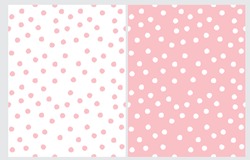 Abstract Hand Drawn Dotted Seamless Vector Patterns. WhiteDots Isolated On A Light Pink Background. Pink Polka Dots On A White Layout. Simple Geometric Irrgeular Vector Prints.