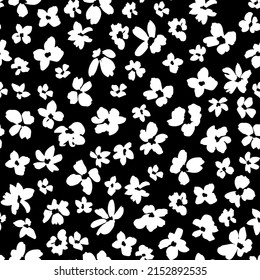 Abstract hand drawn flower heads seamless repeat pattern in black and white. Random placed, monochrome, vector florals all over surface print.