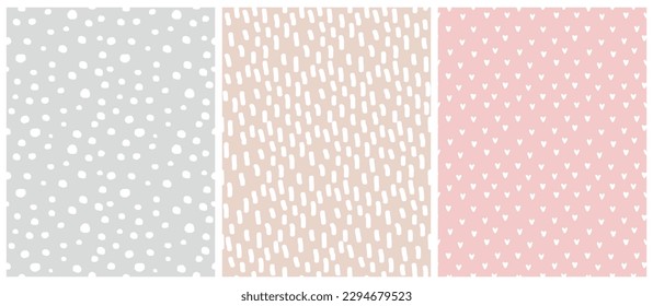 Abstract Hand Drawn Geometric Vector Patterns. White Spots,Lines and Hearts Isolated on a Pink, Gray and Beige Background. Irregular Geometric Repeatable Vector Print ideal for Fabric,Wrapping Paper.